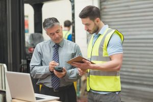 workers discussing facility management